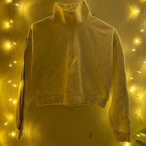 Billabong White cropped quarter zip with graphic saying